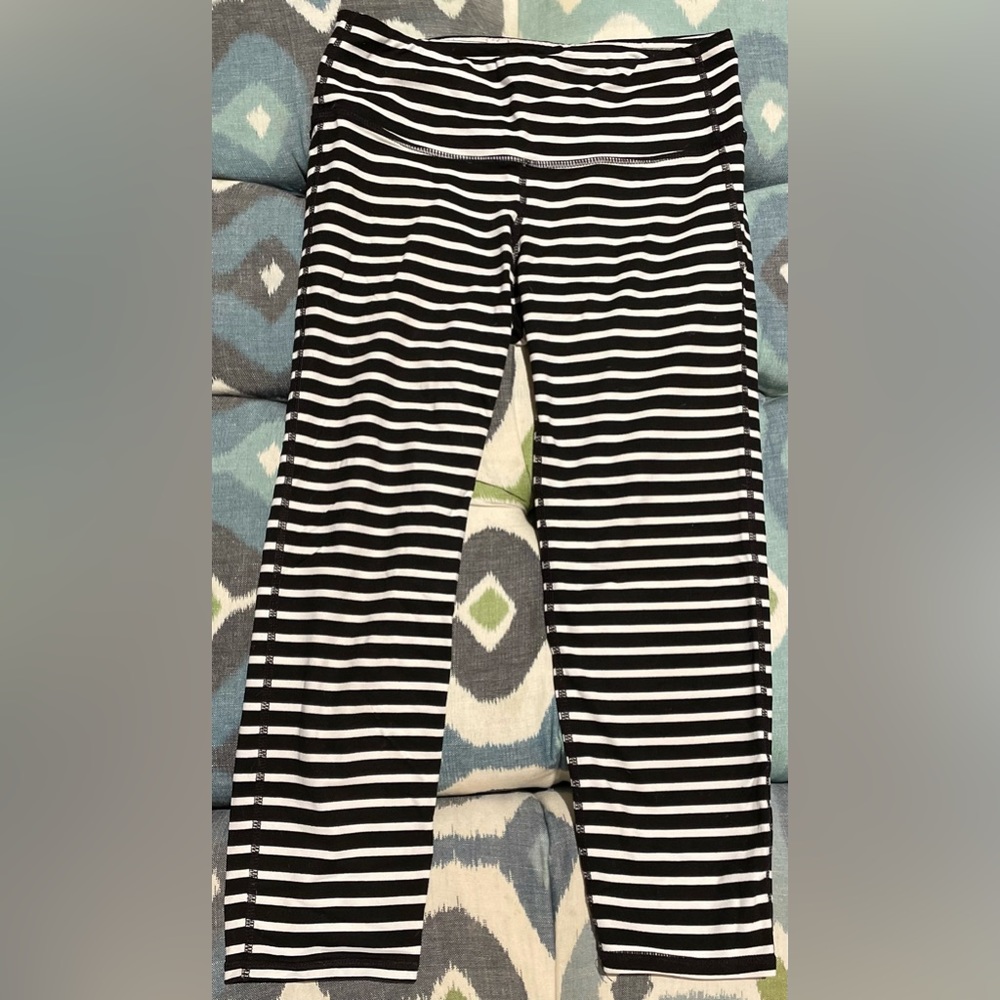 Athleta black and white strip capris pants.